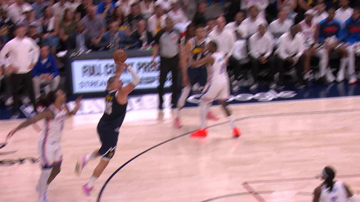 Jokić with a WILD leaning triple to beat the half-time buzzer 🤯