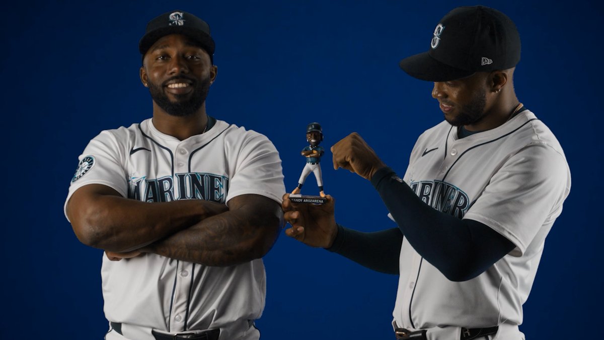 We think Randy likes his first-ever Mariners bobblehead 🤣 >> <<