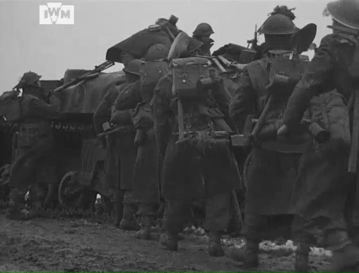 Soldiers of the Devonshire Regiment enter the village of Echt, the Netherlands, 18 January 1945. Film: IWM A70 230-1