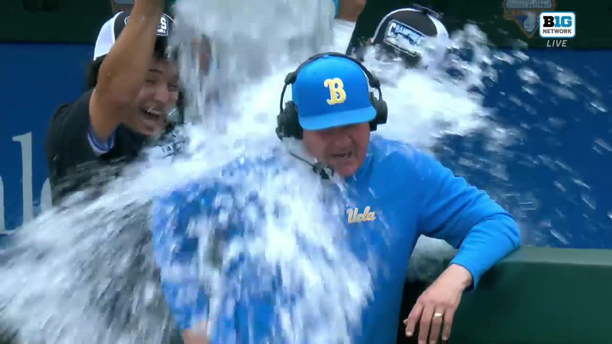 John Savage didn't see it coming 😊 Watch UCLA Baseball give the longtime coach a celebratory ice bath during his postgame interview 👇 #B1GBaseball