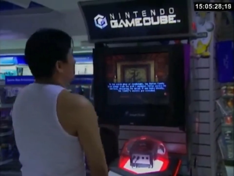 Shopping in the video game section at FYE in 2002