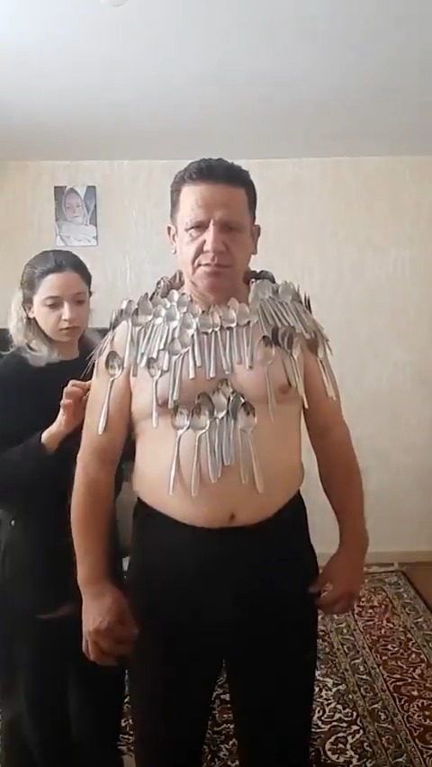 54-year-old man balances 96 spoons on body to break own world record โI can stick any object to my bodyโฆeven a fully grown humanโ