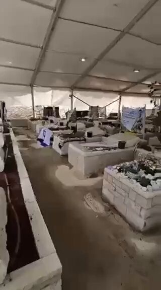 An Israeli soldier leaks footage from inside a cemetery of Israeli soldiers killed in Gaza.