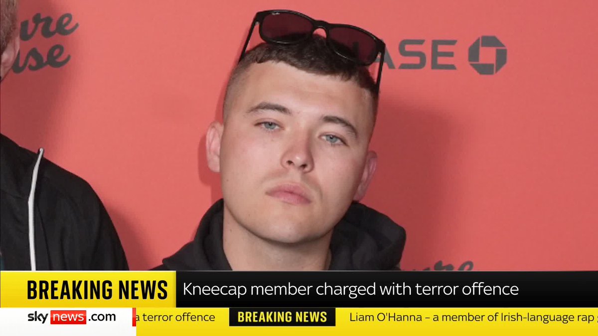 A member of Irish-language group Kneecap has been charged with a terror offence. Liam O'Hanna, or Liam Og O Hannaidh, has been charged with displaying a flag in support of Hezbollah, a proscribed organisation, the Metropolitan Police said. 📺 Sky 501/YT