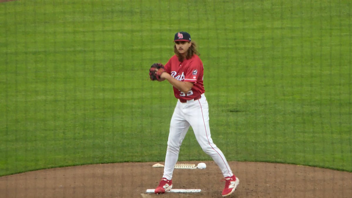 WATCH: Rhett Lowder's first and only pitch in the second inning before being walked off with a trainer. You can see him grabbing his side after following through with his delivery. #Reds #MiLB #Bats
