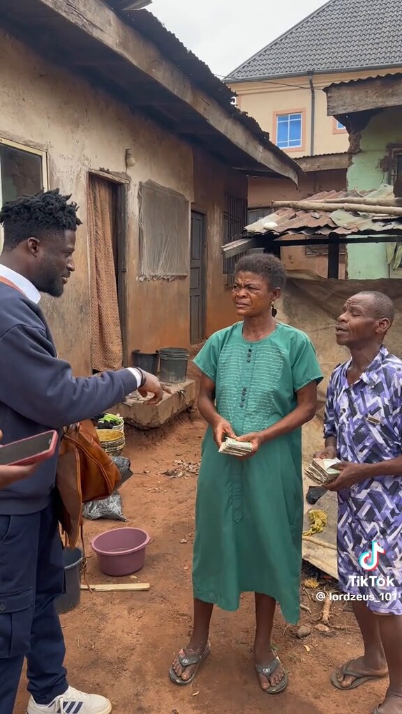 In the first video , she snatched the money from the man In the second video , she’s angry the man is getting more money !! What do you think is going on ?