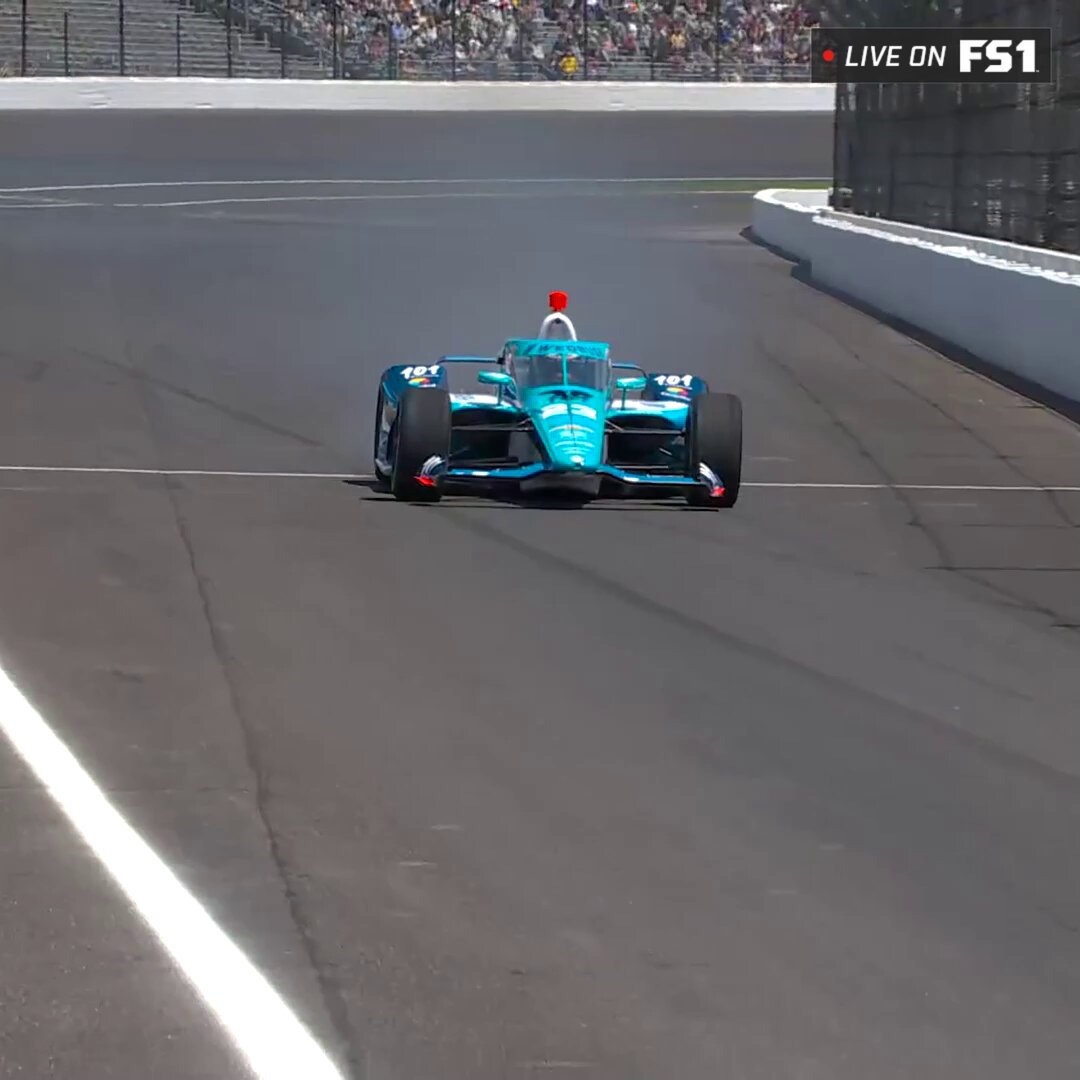 FIRE from the No. 23 machine 😳 Ryan Hunter-Reay quickly climbs out of his car on pit lane.