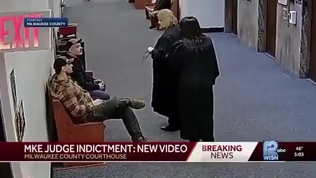 Security footage of Wisconsin Judge Dugan lying to federal agents in order to make them leave their position then helping an illegal out of her courthouse to avoid arrest. If I had to guess this isn't the first time she's done this. Likely just the first time under this administration... #CityLife #JudgeDugan #winconsin #hannahDugan #illegals #crime #corruption #judge