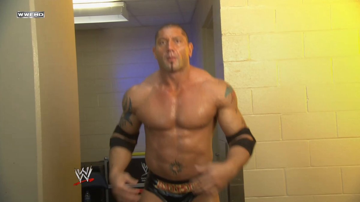Back then, I always wondered how that "fan" even got backstage to interrupt Batista's camera shot 😂