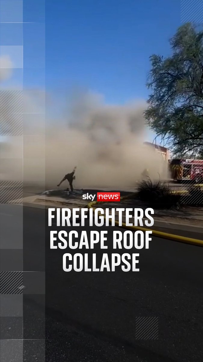 Firefighters in Tucson, Arizona, had a lucky escape after the roof of a building collapsed as they battled a blaze.