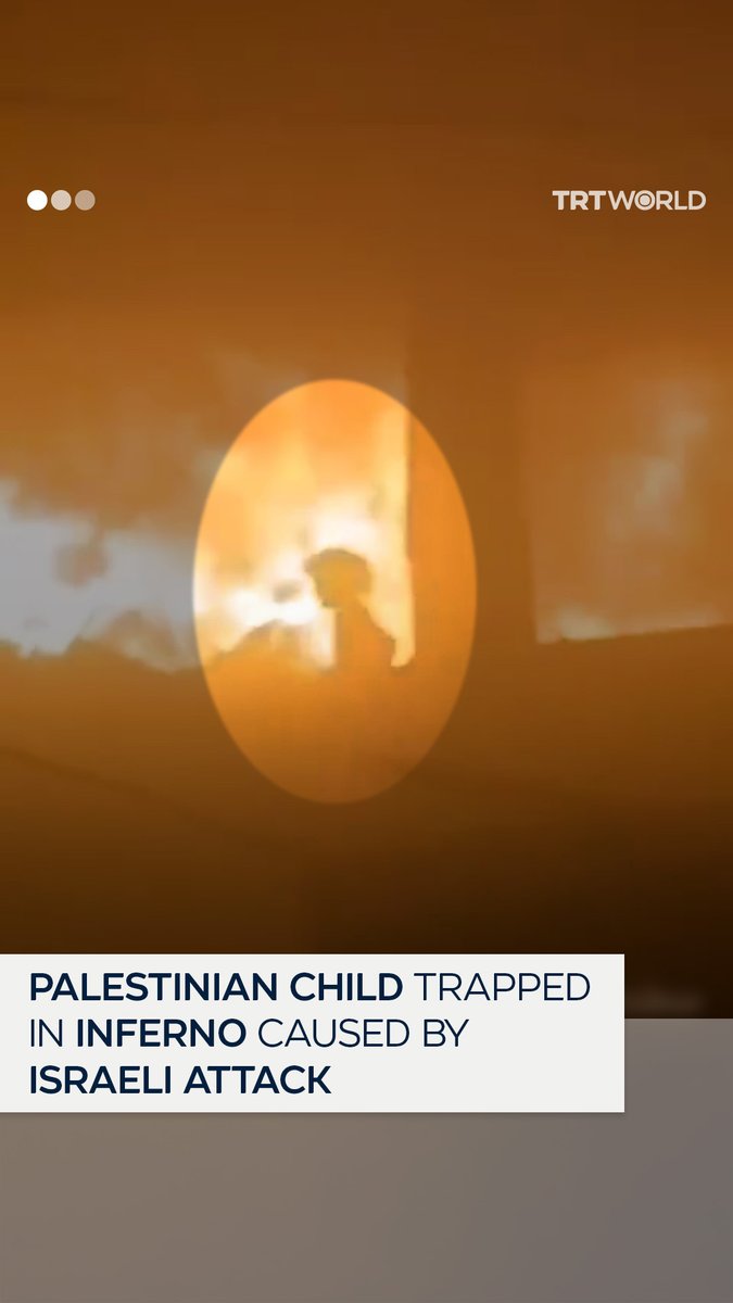 A little Palestinian girl is seen trapped, trying to escape the inferno caused by Israel's bombing of the Jerjawi school in the Daraj neighbourhood of Gaza City