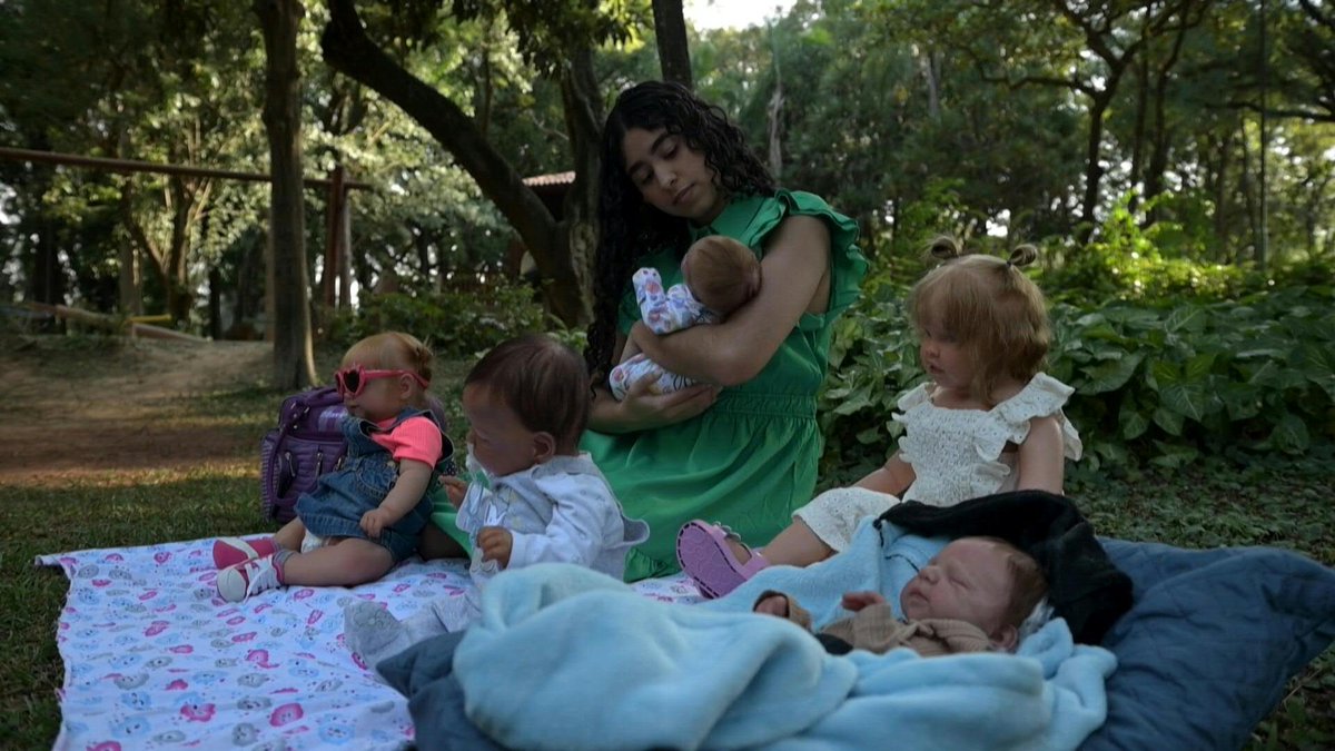 🇧🇷 VIDEO: In Brazil, the demand for hyper-realistic dolls, meticulously crafted by artists to look just like a real infant is surging. The popularity of the so-called 'reborn babies' has sparked criticism from both social media and lawmakers.