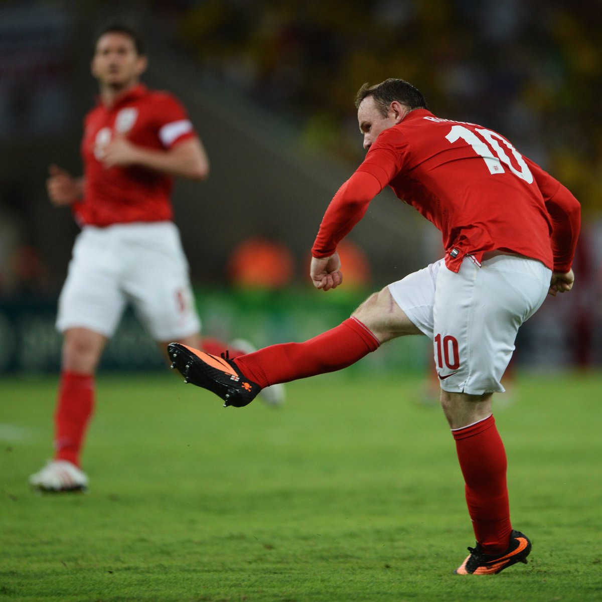 Here's Wayne Rooney at the Maracanã, dispatching a bright orange flyaway into the top corner with extreme prejudice to brighten up your Monday morning. Filmed on the world's first photographic device, too.