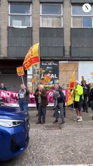 Protesters are gathering in Hamilton as Nigel Farage is set to make a campaign visit this afternoon.