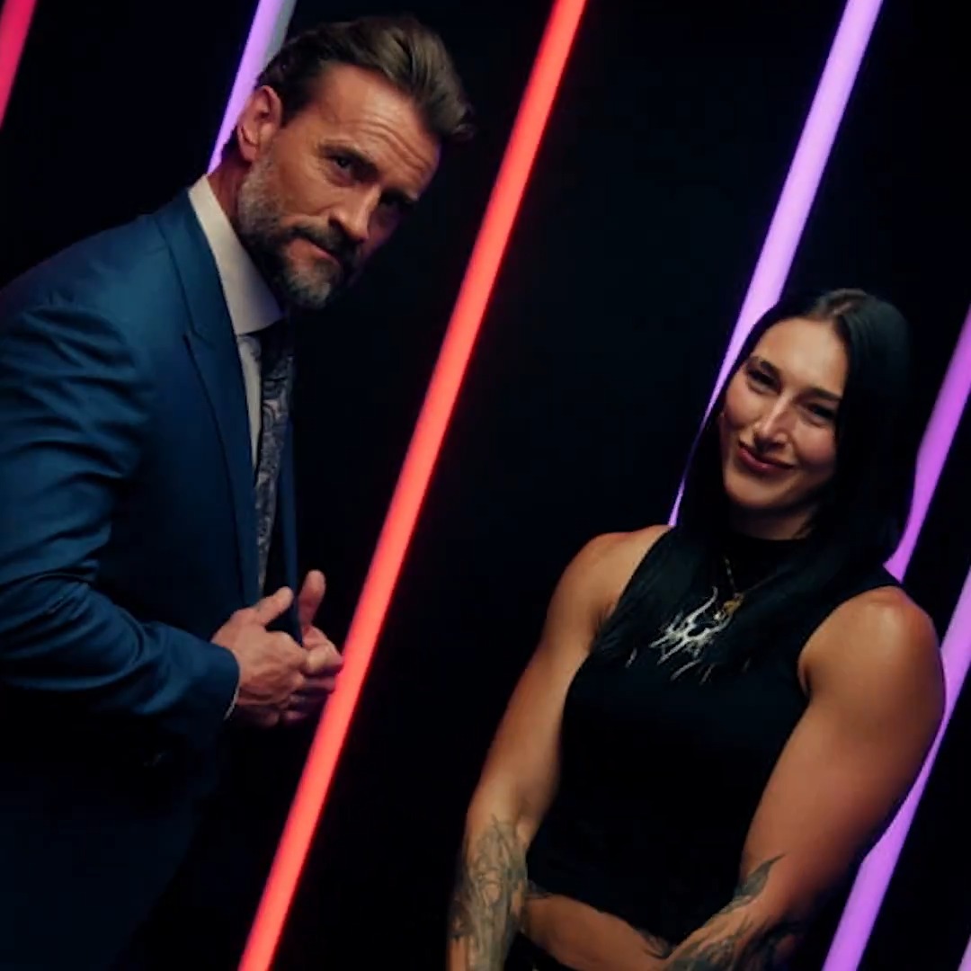 CM Punk and Rhea Ripley at #TUDUM #RAWonNetflix starts NOW