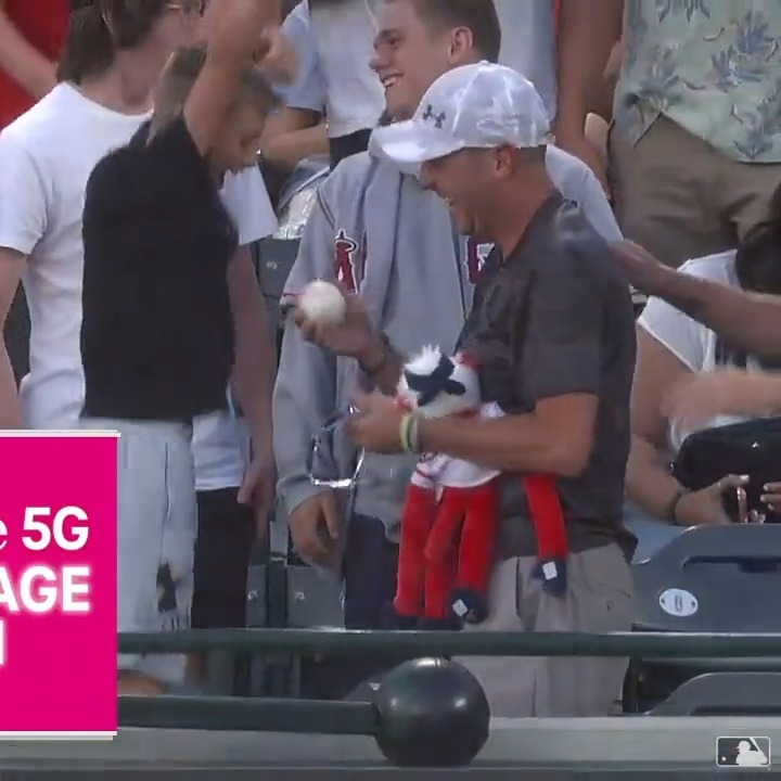 This fan caught a baseball and gave it to a young fan. A few innings later, this happened..