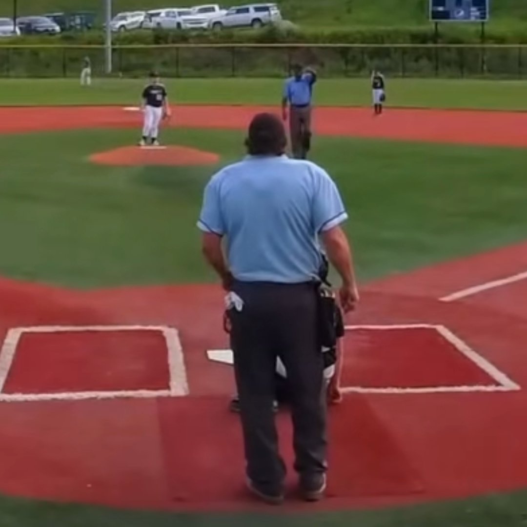A foul ball from another field landed in this umpire’s pocket. What’re the odds?! 🤯