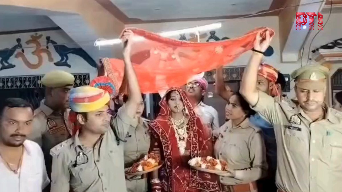 VIDEO | Uttar Pradesh: Police stepped in as guardians for a woman who recently lost her brother in a dacoity at their home in Gonda, during which valuables were also looted. The police officials extended financial assistance and helped organise her wedding, which had been virtually called off due to the family’s financial distress following the tragedy. Here's what Gonda Superintendent of Police Vineet Jaiswal said. "Nearly 1.5 months ago, a man was fatally shot in a dacoity. Four of the six accused are in jail and the rest have been killed in encounters by the police and STF. It was later discovered that a wedding was set to happen and was called off after the tragedy. Since the family was not doing well financially, the police and STF decided to provide some help." (Source: Third Party) #Gonda