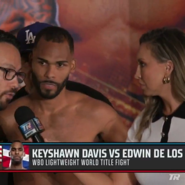 Edwin De Los Santos reacts to Keyshawn Davis coming in over the 135 pound limit.
