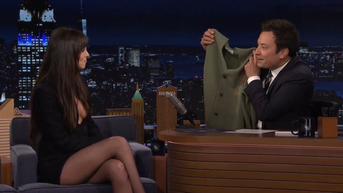 Welcome to the Sisterhood of the Traveling Cardigan, Dakota Johnson. Your sweater is in good hands, Don.