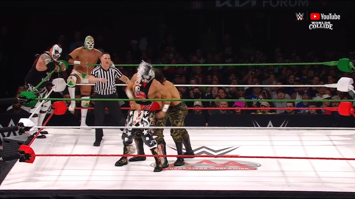 Through the turnbuckles?! Psycho Clown🤡 is WILD! 😳 #WorldsCollide ▶️