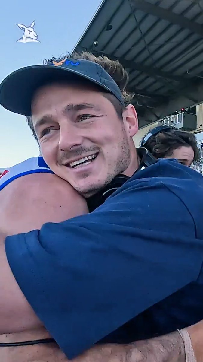 "I'll go sing the song, give me a Gatorade shower!" 💦 Never mind that one game for the Coasters. BackChat Studios's Hamish Brayshaw, son of former North Melbourne player and board member Mark, is a Roo through and through 💙🤍 #Kangas