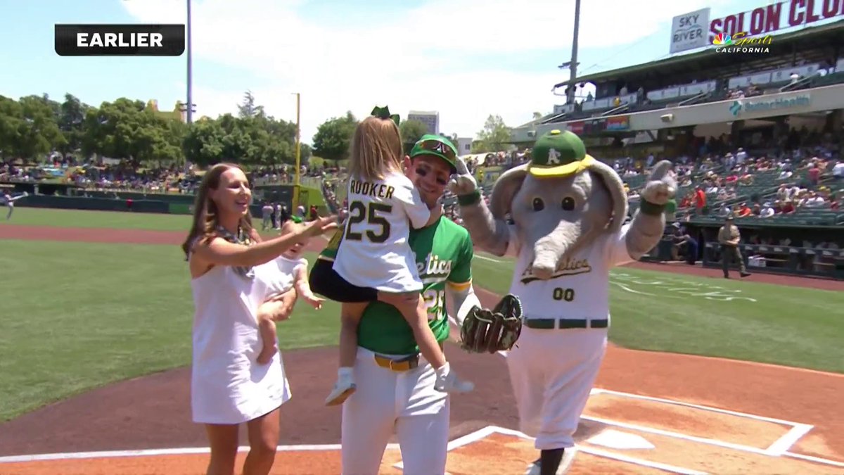 The Rooker family threw out the first pitch on his bobblehead day 💚