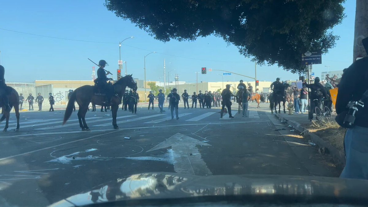 This just happened. Rubber bullets fired and horse-mounted LAPD patrol comes out and start hitting a man with batons. #LosAngelesProtests #LAPD