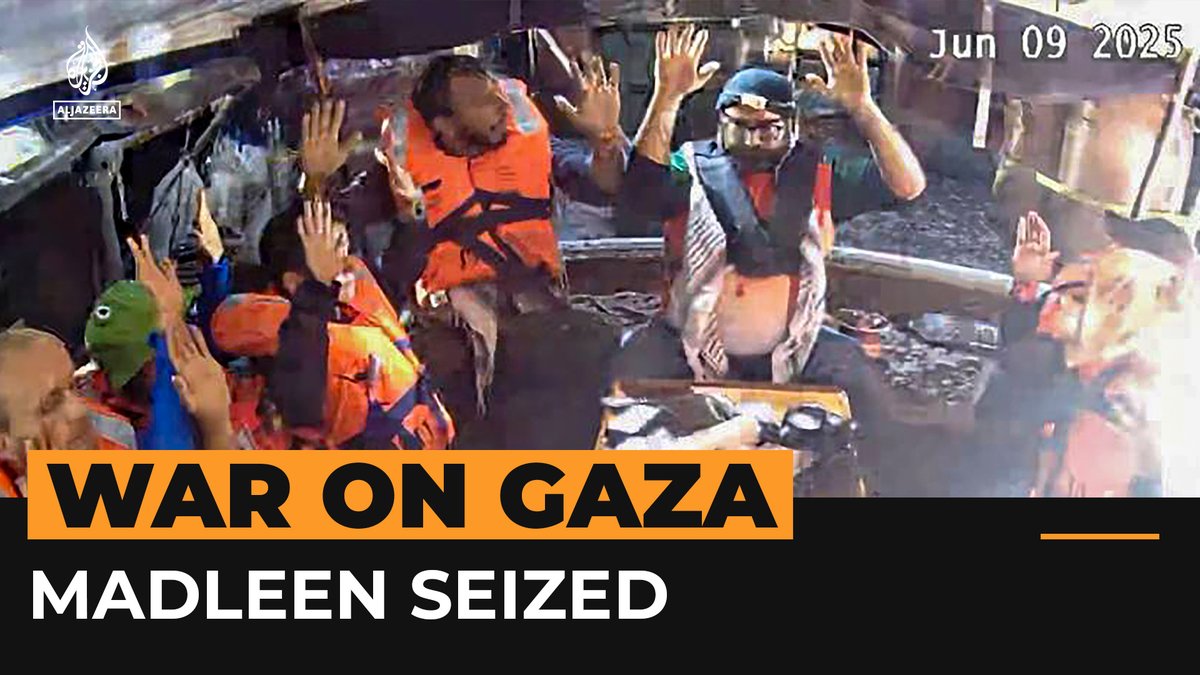 Video from Al Jazeera Mubasher showed the crew of the Gaza Freedom Flotilla Coalition’s Madleen in life jackets with their hands raised as the ship was about to be raided by Israeli forces. Communications with the vessel were cut shortly after.