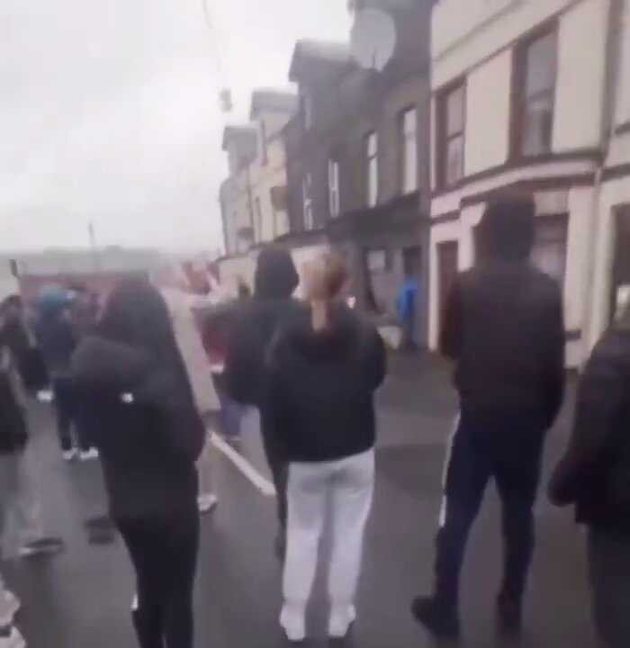 🚨🇬🇧 Meanwhile in Ballymena, N.Ireland Locals erupt following the serious sexual assault of young girls in the small town of Ballymena. Legacy Media don’t identify the suspects but confirm a ‘interpreter’ was required to assist in charging the offenders.