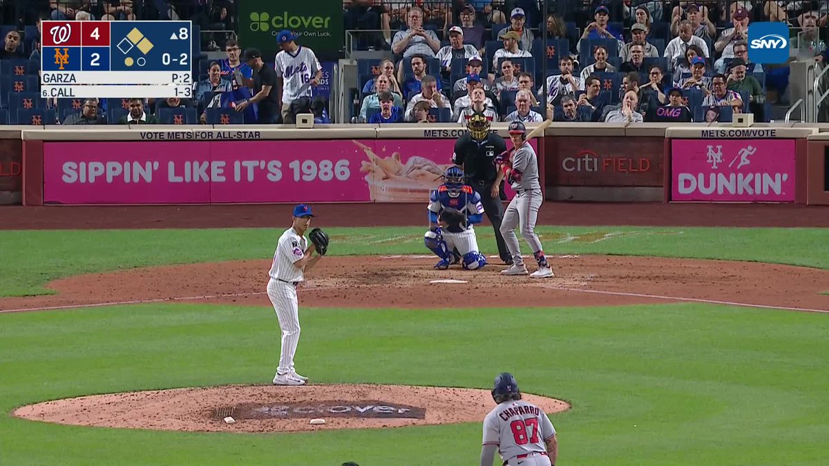 Justin Garza strikes out the first two batters he faces as a Met