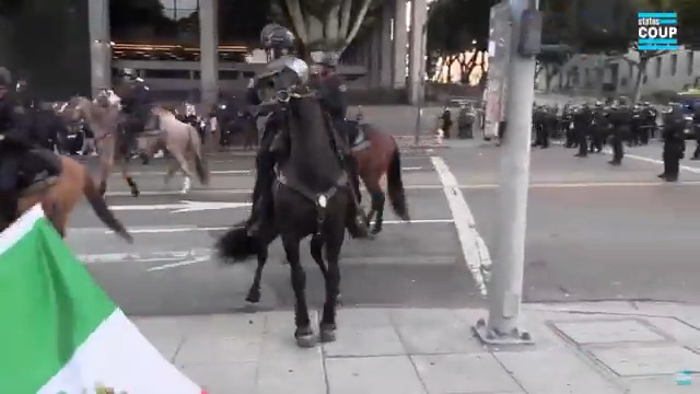 🚨LA police on horses rush into crowd of ICE Raid protesters and start shooting "less lethal" ammunition—creating a CHAOTIC situation and freaked out horses. One female protester "seriously injured" from less lethals, our Notorious Tinatanium 🆓 reports ON-THE-GROUND. LIVE link below