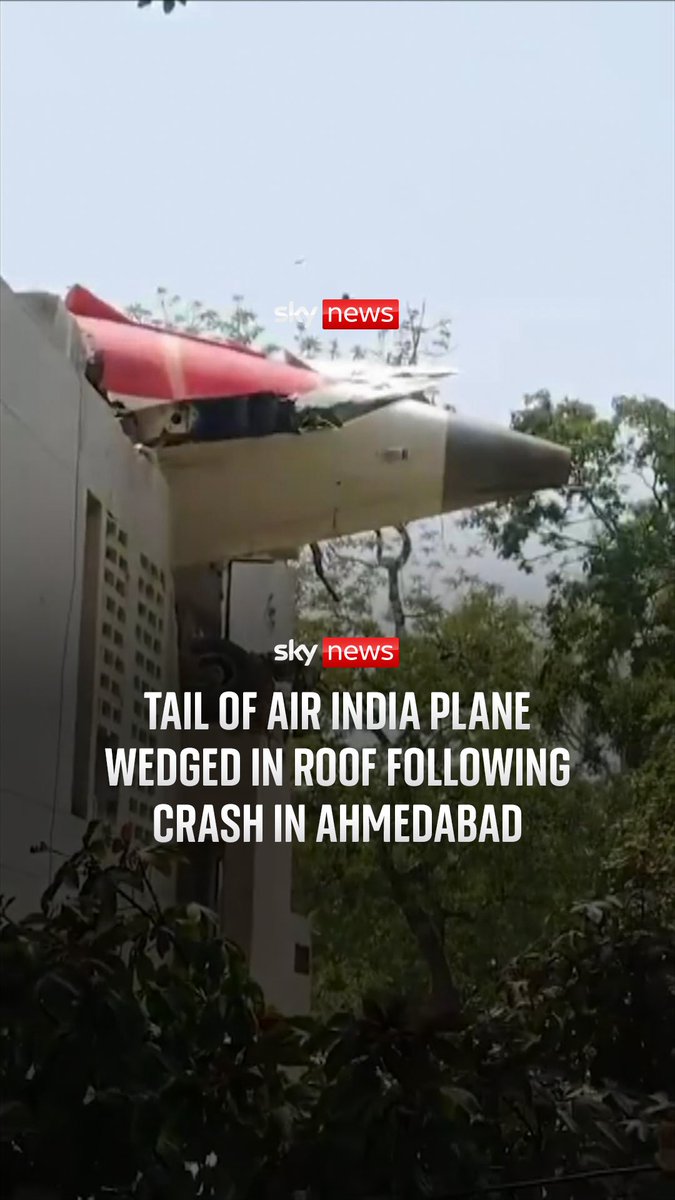 Footage shows the tail of an Air India plane wedged in a roof following a crash in Ahmedabad. There were 53 Britons on board the plane when it crashed, according to the airline and 169 are Indians, seven are Portuguese and one is Canadian.