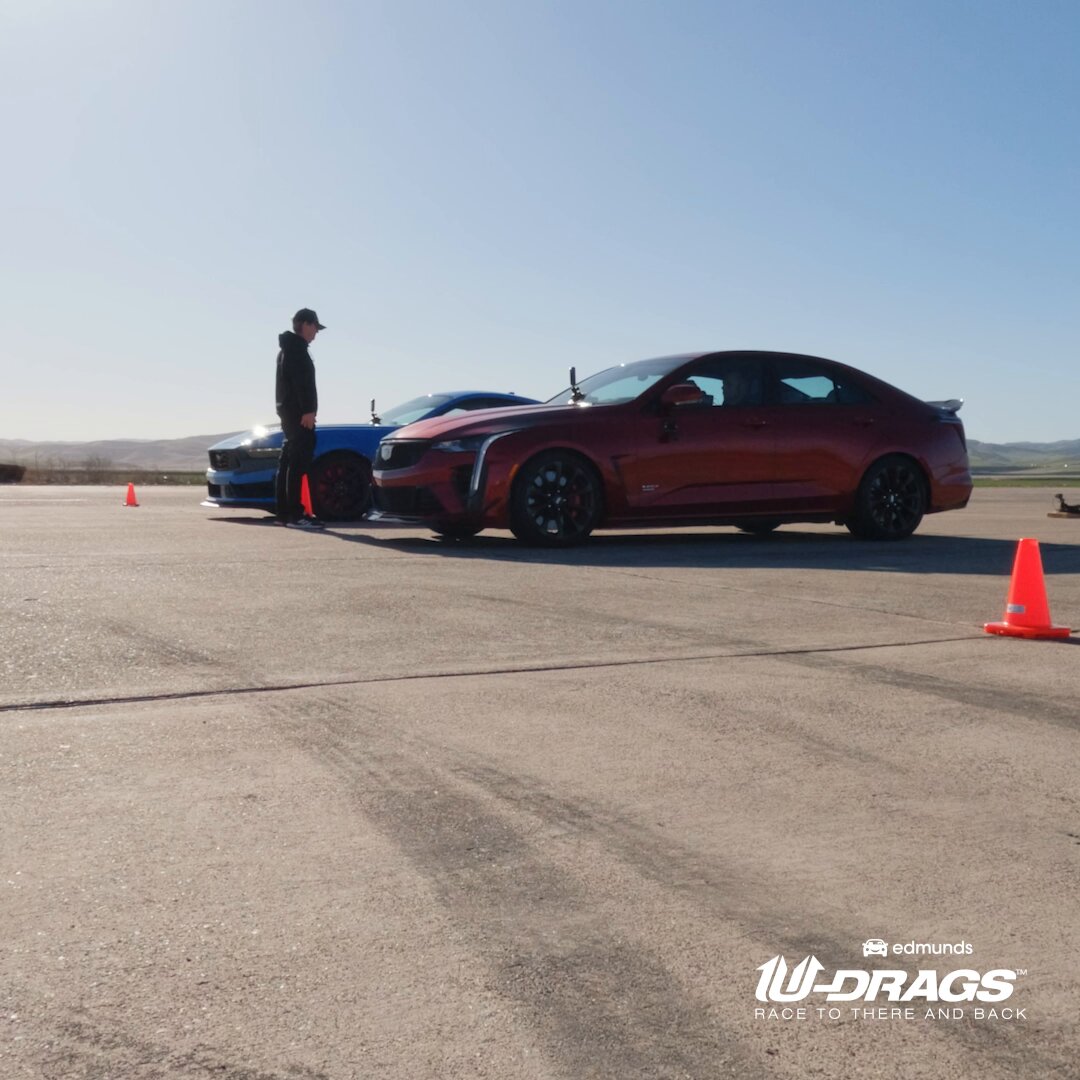 Both have automatic transmissions, both are rear-wheel drive, and they're both as American as apple pie The Ford Mustang Dark Horse and Cadillac CT4-V Blackwing go head to head in the latest Edmunds U-Drags race