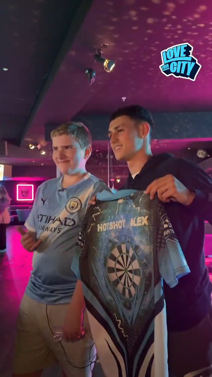 .Phil Foden, Savinho, Nico O'Reilly and Vitor Reis surprised Alex, a City and darts fan who's been going through a tough time recently, for a match he'll always remember 🎯🩵 #LoveThisCity