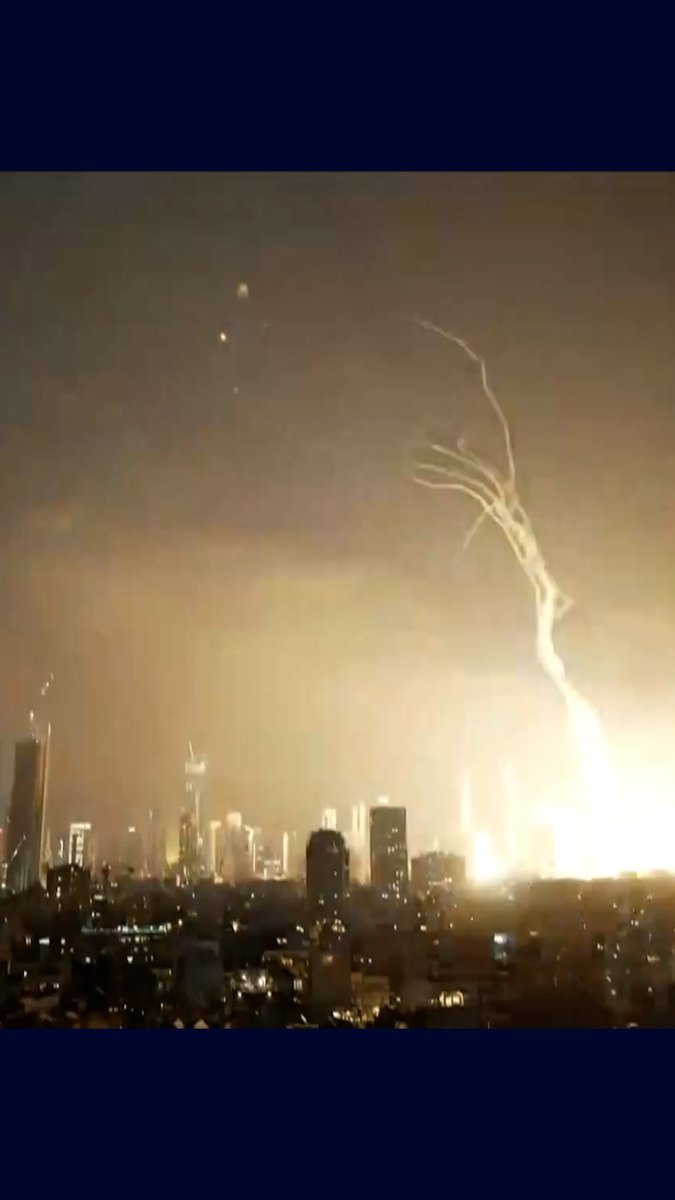RAW: Iran has launched several ballistic missiles towards Israel. These moments are from Tel Aviv where plumes of smoke can be seen: