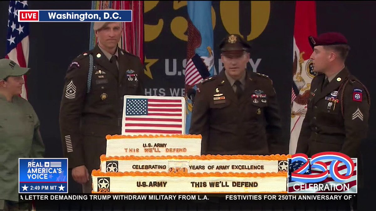 CUTTING THE CAKE WITH AN ARMY SABER Celebrating 250 years of the U.S. Army with the traditional cutting of the cake and the Army song.