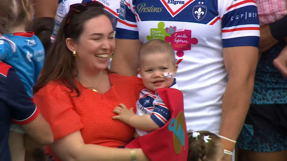 Wakefield Trinity coach Daryl Powell and his family bring grandson, Clarke, on to the pitch ahead of their game against Leigh - who was diagnosed with acute myeloid leukaemia in January. Wakefield are raising money to provide support to children with cancer in Yorkshire 👏