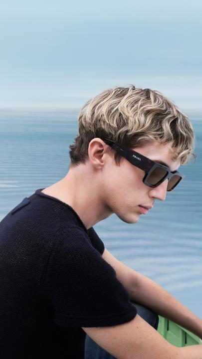 Troye between sea and sky. Explore Prada “Days of Summer” at: Creative Directors: #MiucciaPrada and #RafSimons Photography: Oliver Hadlee Pearch Campaign Creative Direction, Film Direction: Ferdinando Verderi Cast: Troye Sivan #PradaSummer #PradaEyewear #Prada