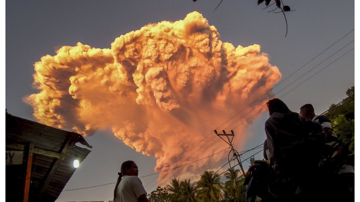 Mount Lewotobi Laki Laki in eastern Indonesia erupted Tuesday, blanketing the sky with a more than six-mile-high ash cloud and prompting authorities to raise the country’s volcanic alert level.