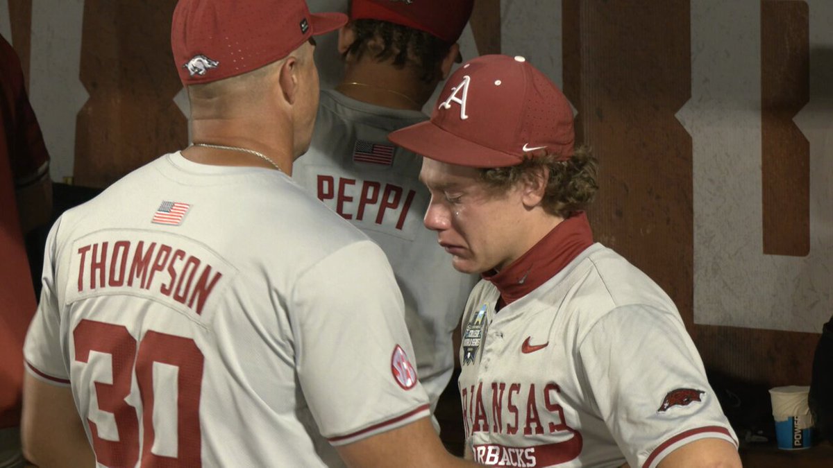 Almost every Arkansas player embraced Charles Davalan following the Razorbacks loss to LSU