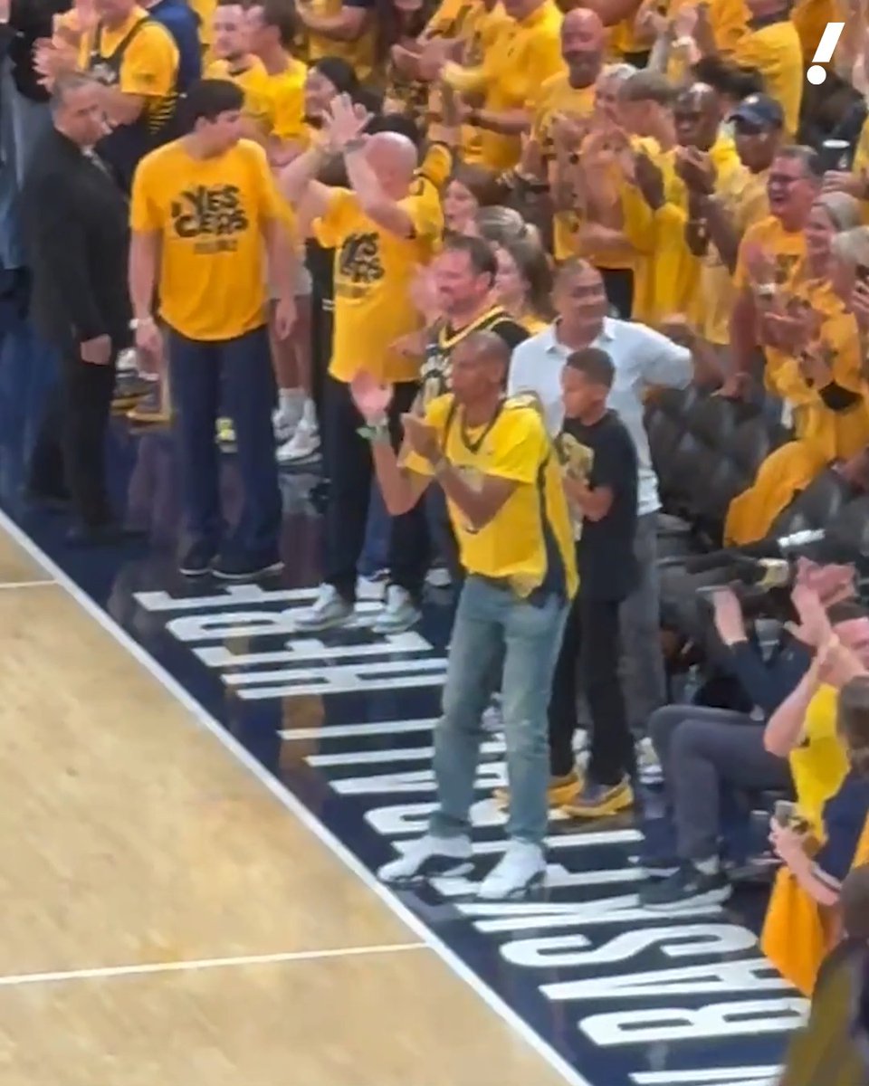 Reggie Miller in a JALEN ROSE jersey front row getting getting hyped ๐