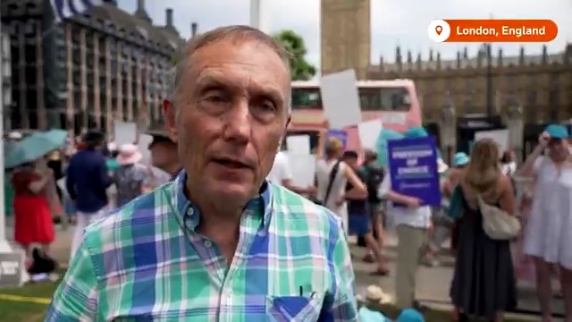 Protesters for and against the assisted dying law rallied on opposite sides of a street outside Britain's parliament, as lawmakers voted on the bill