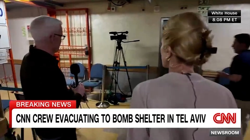 CNN's Anderson Cooper, Clarissa Ward and Jeremy Diamond evacuate after receiving a 10-minute warning of an incoming missile in Tel Aviv, Israel.