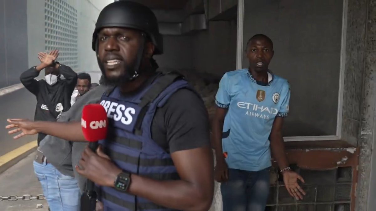 Kenyan police cornered peaceful protesters in a blocked alley, beat them up, then teargassed them. "Larry ukienda tutauliwa," one of them said. "If you leave, we'll get killed." Police brutality during protests against police brutality