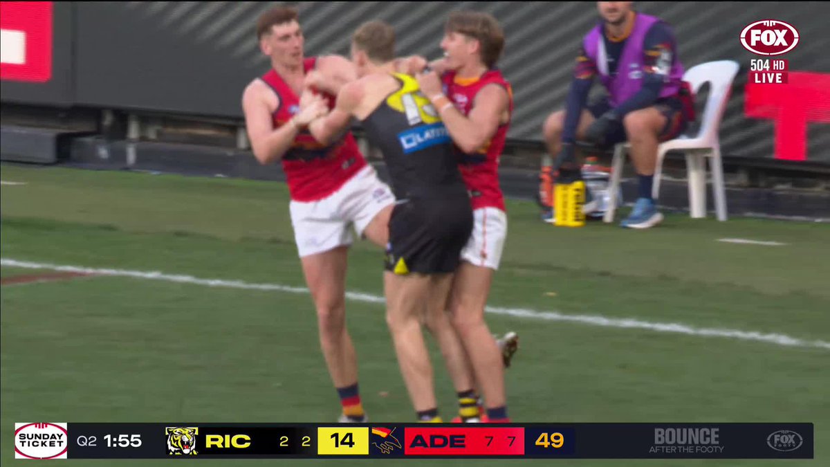 "Lynch is in a lot of trouble here." Tom Lynch was reported for this incident in the second quarter. 📺 Watch #AFLTigersCrows LIVE on ch.504 or stream on Kayo: ✍️ BLOG 🔢 MATCH CENTRE