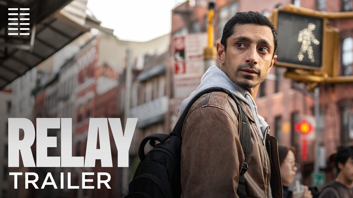 First trailer for David Mackenzie’s ‘RELAY’, starring Riz Ahmed and Lily James. The film follows a secretive "fixer" who brokers payoffs on behalf of corrupt corporations In theaters on August 22.