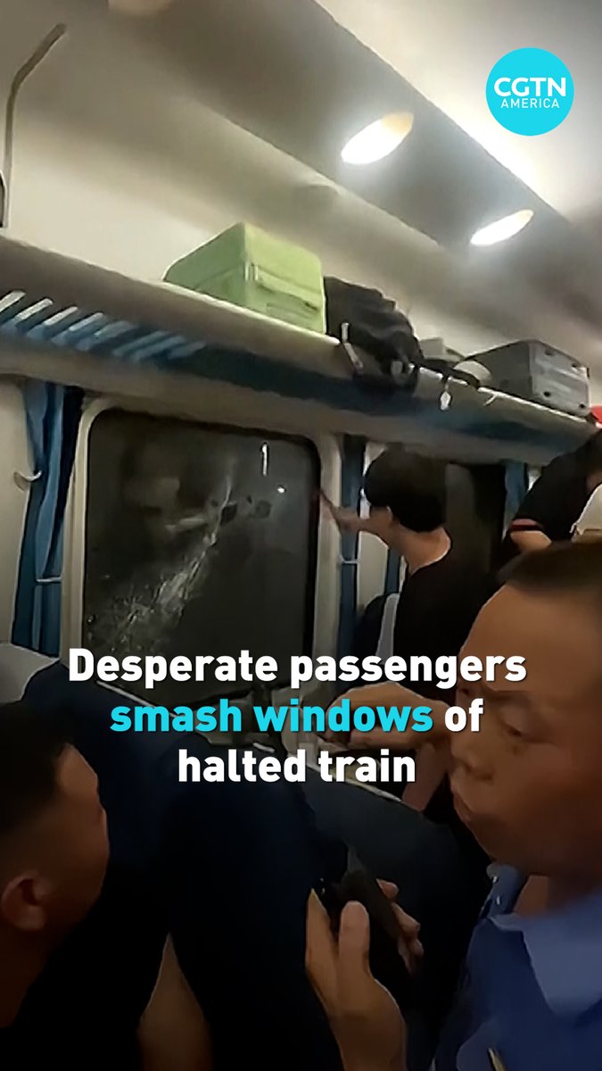 Passengers trapped in China's K1373 train after collision w a truck. AC outage as the train stopped for 3 hrs made cabins unbearably hot. Passengers demand for staff to open doors to allow in fresh air ignored. 1 man smashed the window. Wyd?