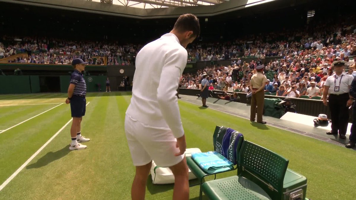 Ready for this one? 🍿 Novak Djokovic and Alex de Minaur make their way out onto Centre Court for their fourth round meeting - and there's a familiar face watching on from the Royal Box 👋 #Wimbledon