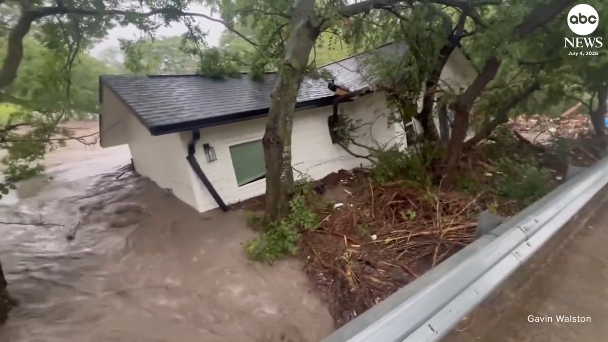 Footage shows a house carried away by the devastating floodwaters in Texas on the Fourth of July. At least 94 people have died in the state, as of Monday, with officials saying the search-and-rescue effort continues.